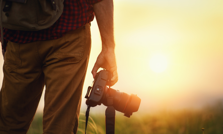Persoon met camera in de hand